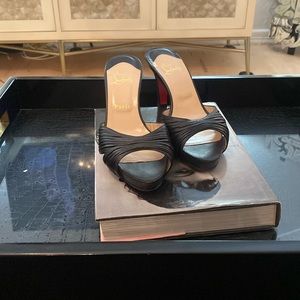 Authentic Christian Louboutin black heels.